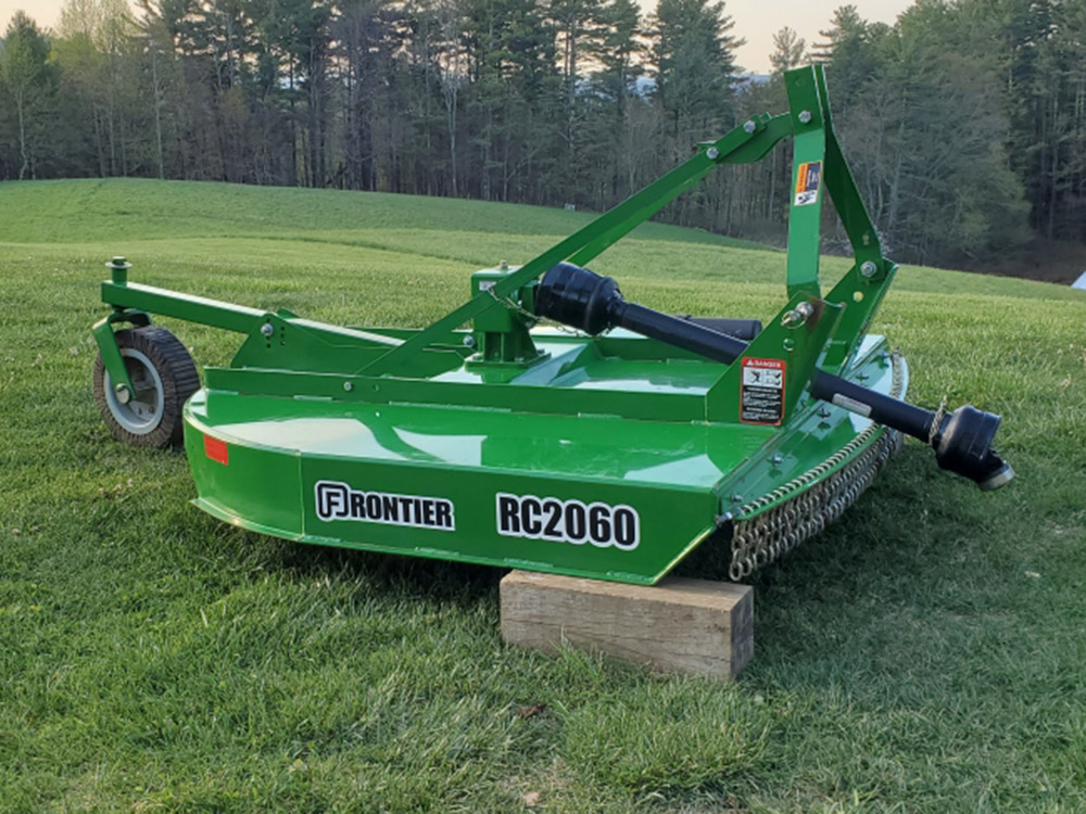 BUSH HOG WITH TRAILER.